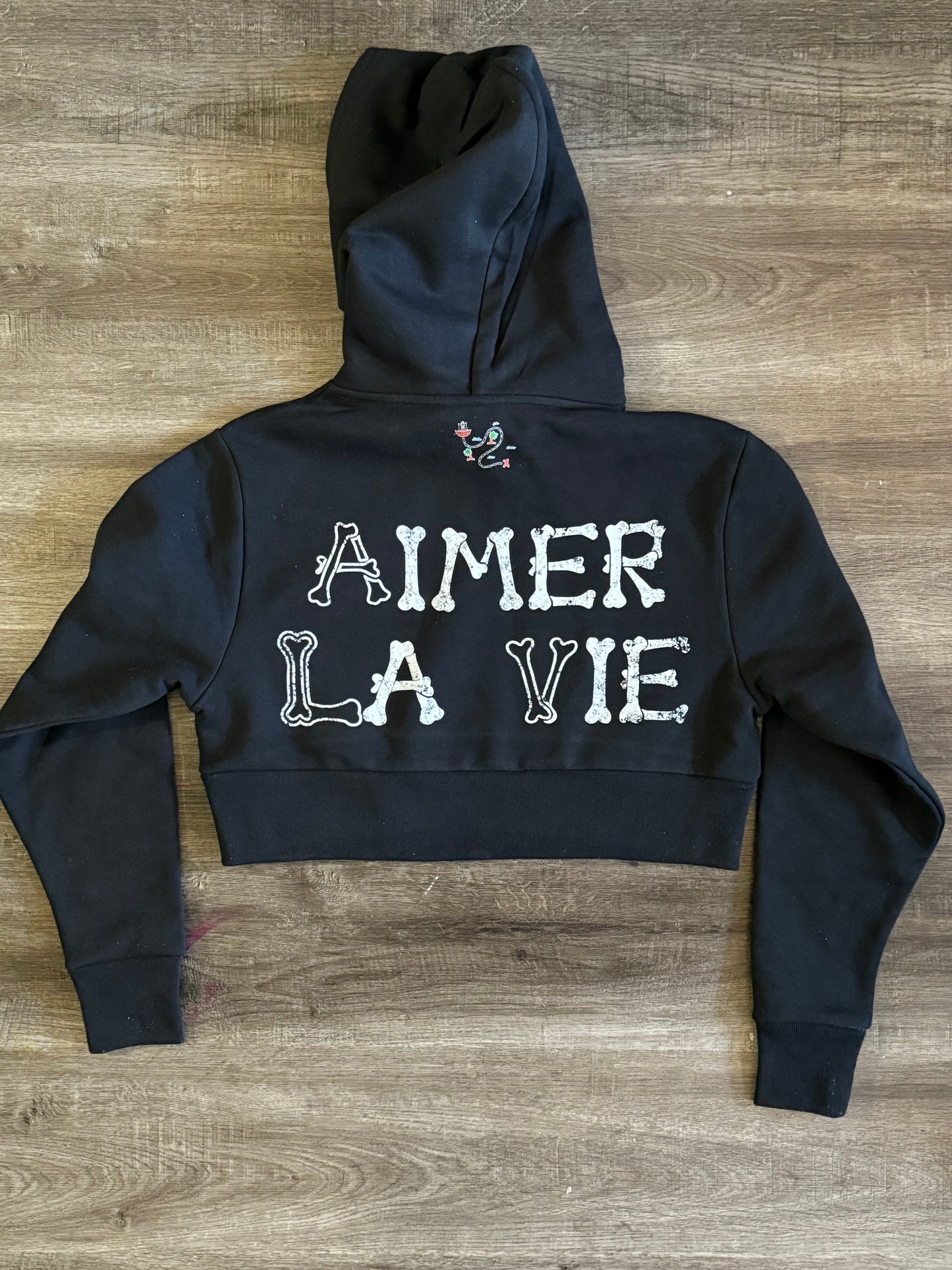 Woman’s cropped bones pullover